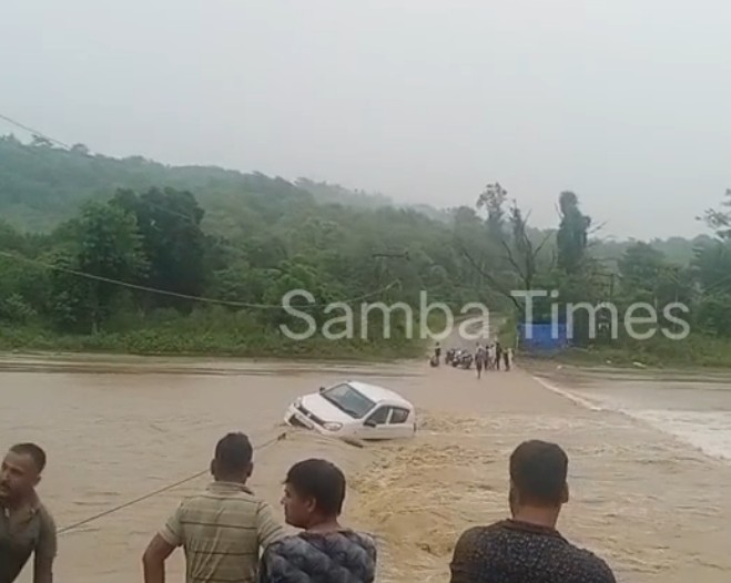 Watch, Car washed away in heavy rains: Driver rescued
