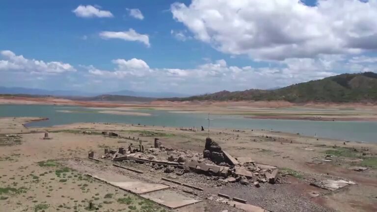 Receding levels from a Philippines dam in Nueva Ecija has revealed the ruins of a centuries-old town